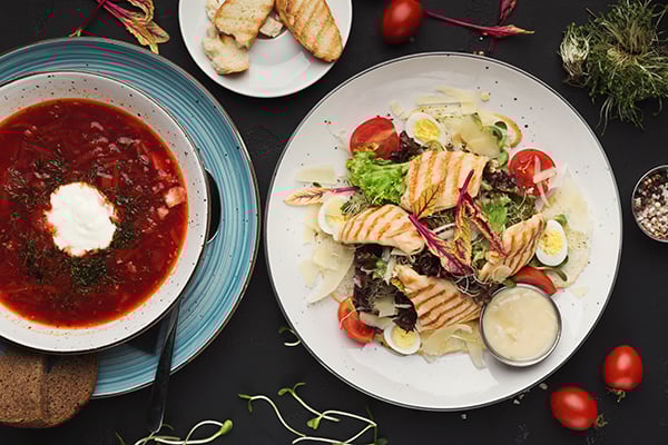 lunch-at-restaurant-two-courses-top-view-3BEMNP8