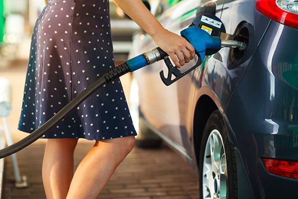 woman-fills-petrol-into-her-car-PPVJUSB